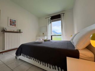Tavernola Suites • A due passi dal Traghetto