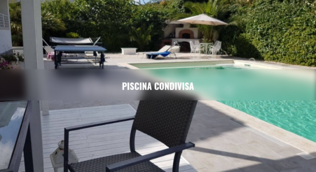 INFERNETTO AXA BILOCALE ARREDATO CON PISCINA CONDIVISA