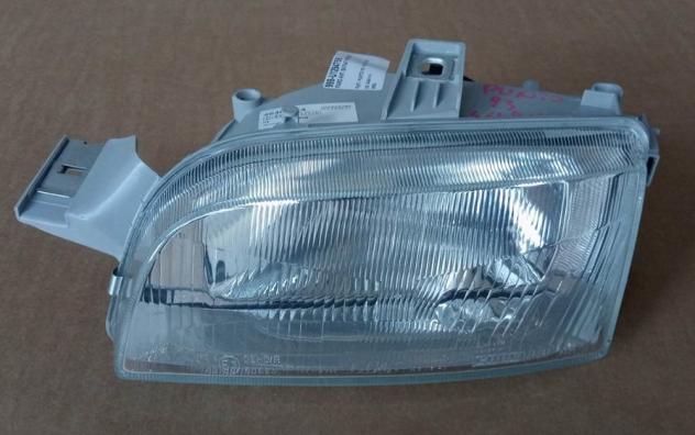 FARO ANT. SX FIAT PUNTO 93 999-U1294756 Parti elettriche  Fanaleria  Proiettori  Proiettore ant. FIAT - PUNTO I 55 / 60 / 85 / GT - 01-11-1993 - 01-08