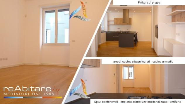 Elegante ed ampio TRILOCALE con arredi e finiture di pregio