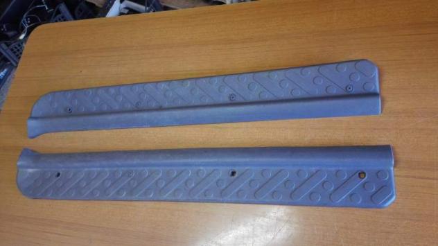 Coppia Plastiche battitacco Terrano II 2.7 Tdi 3p. SR '99