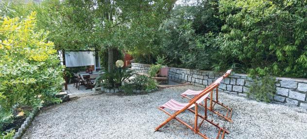 Appartamento ristrutturato con giardino e posto auto