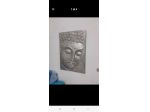Quadri in alto rilievo di budda indonesiani