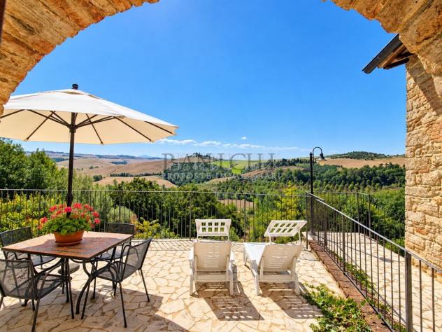 Appartamento rustico con terrazza panoramica e piscina comune - Foto 16