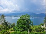 Nel verde bilocale arredato vista lago