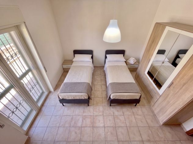 Camere in affitto in appartamento di 100 mq - Foto 9