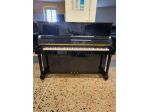 Pianoforte Yamaha E121T seminuovo con trasporto e panca inclusi