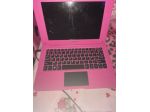 un notebook color rosa + scanner