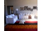 Gervasoni, divano e poltrone GHOST,  design P.Navone, tappeti kilim