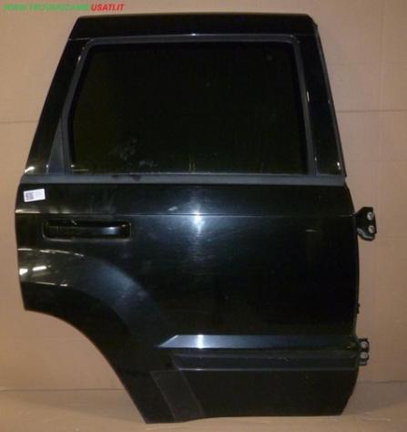 PORTA POST.D. NERO MET C/ALZ. E SERR. VETRO SCURO  Carrozzeria  Lamierati esterni  Porte  Porta post. dx. JEEP - GRAND CHEROKEE - 01-06-2005 - 01-02-2