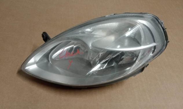 PROIETTORE SX SPINA BIANCA (Da Lucid.) 999-U1296591 Parti elettriche  Fanaleria  Proiettori  Proiettore ant. LANCIA - YPSILON - 01-07-2003 - 01-12-201