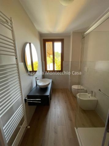 Appartamento con mansarda, garage e giardino esclusivo. - Foto 12