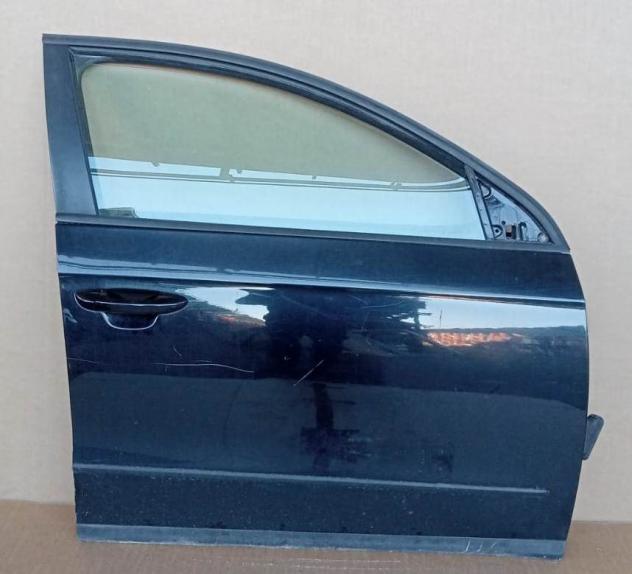 PORTA ANT. DX NERO MET. C/A. e S 999-U1296875 Carrozzeria  Lamierati esterni  Porte  Porta ant. dx. VOLKSWAGEN - PASSAT - 01-04-2005 - 01-10-2010