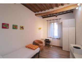 Stanza in appartamento in affitto a Siena