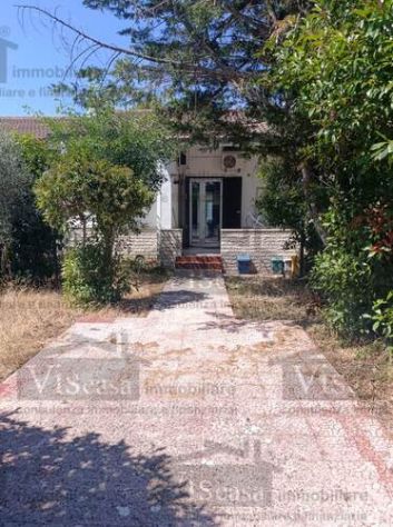 Villa a schiera centrale con giardino
