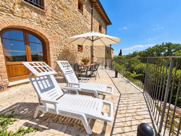 Appartamento rustico con terrazza panoramica e piscina comune - Foto 17
