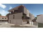 Attico con tre camere, due bagni e balcone di 30 mq