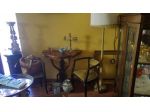 Coppia di poltroncine in legno e velluto verde