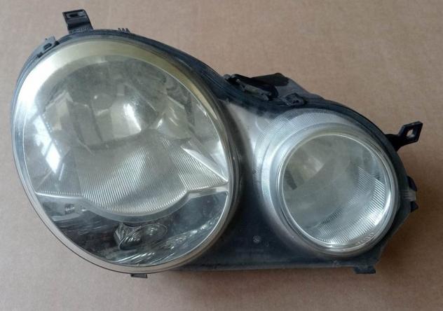 PROIETTORE DX (Da Lucidare) 999-U1293979 Parti elettriche  Fanaleria  Proiettori  Proiettore ant. VOLKSWAGEN - POLO - 01-10-2001 - 01-04-2005