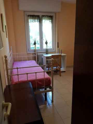 Trilocale con doppio balcone, giardino e posto auto