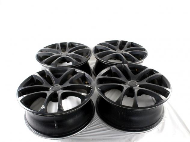SET 4 CERCHI IN LEGA AFTERMARKET DA 17 POLLICI 5 FORI 7.0JX17 H2 ET 35 OPEL ASTRA H 1.7 D 92KW 6M 5P (2008) RICAMBIO USATO DI CUI UNO STRISCIATO, INTE
