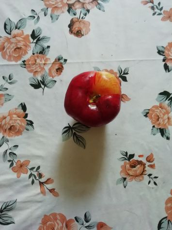 candela a forma di mela