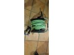 Carrello avvolgitubo e tubo per innaffiare