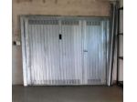 Porta basculante garage in metallo con porta pedonale