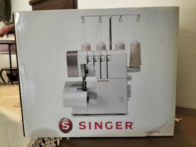 VENDO MACCHINA DA CUCIRE TAGLIACUCI SINGER 14SH754 A 4 FILI - Foto 3