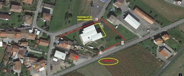 capannone con 2 alloggi con terreno edificabile