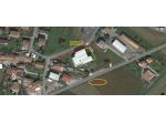 capannone con 2 alloggi con terreno edificabile
