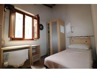 Stanza in appartamento in affitto a Siena
