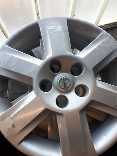 4 cerchi in ferro usati 6 1/2x16 et 40 con copricerchi originali Nissan Quashai