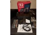 Nintendo Switch 2 Console Come Nuova poco uso Boxed con 9 giochi