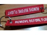 Remove Before Flight Portachiavi in Rosso / Bianco