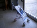 Passeggino Bebè Confort con chiusura ad ombrello.