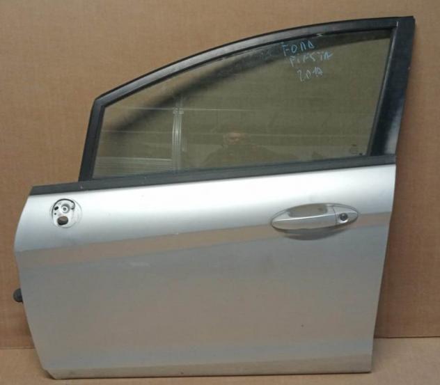 PORTA ANT.SX ARGENTO MET. C/ALZ. E SERR. 999-U1294131 Carrozzeria  Lamierati esterni  Porte  Porta ant. sx. FORD - FIESTA - 01-12-2008 - 01-11-2012, F