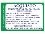 Medaglie distintivi divise elmetti foto cartoline militari ecc.