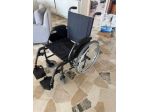 Carrozzina pieghevole - sedia a rotelle