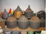 vendesi damigiane, bottiglie, bottiglioni