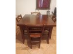 Tavolo pieghevole in legno massello con 4 sedie – €170