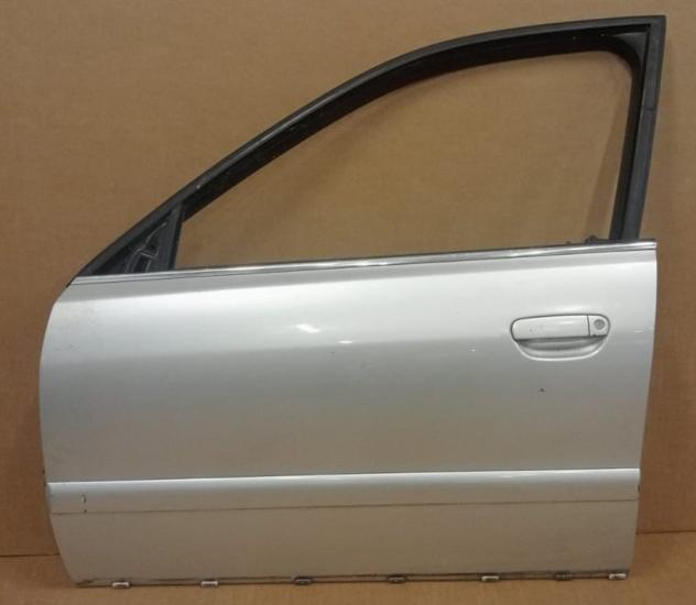 PORTA ANT.S. ARGENTO C/ALZ. E SERR. RESTYLING 99 - 2001 999-U17604 Carrozzeria  Lamierati esterni  Porte  Porta ant. sx. AUDI - A4 - 01-02-1995 - 01-1