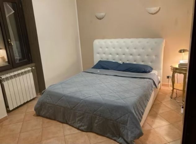 EUR MAGLIANA-BILOCALE CON GIARDINO PRIVATO. - Foto 3