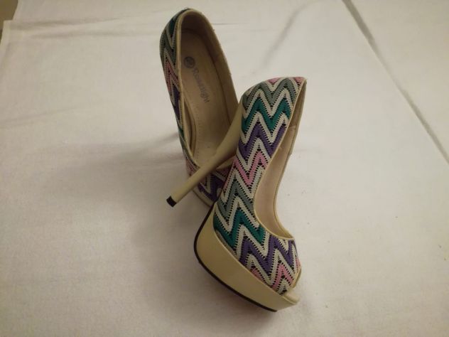 Vari modelli scarpe e vestiti usati - Foto 4