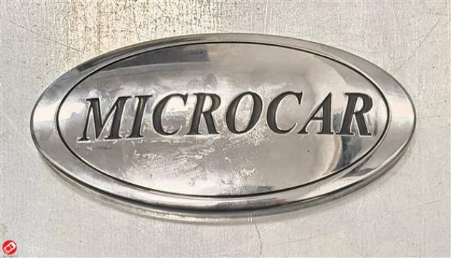 LOGO CALANDRA MICROCAR M.GO/M8