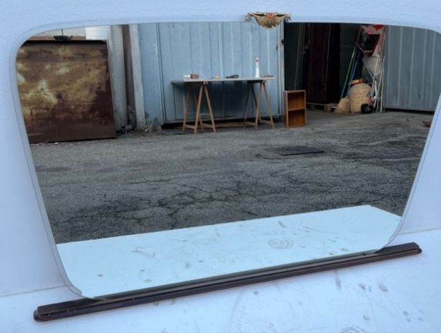 Specchio con ottone centrale