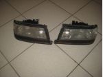 FARO ANTERIORE CON FRECCIA  LANCIA THEMA LX
