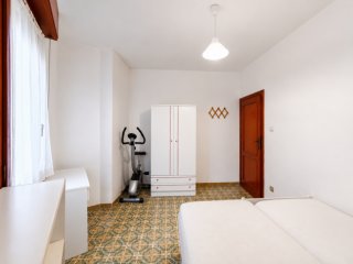 Stanza in appartamento in affitto a Sassari