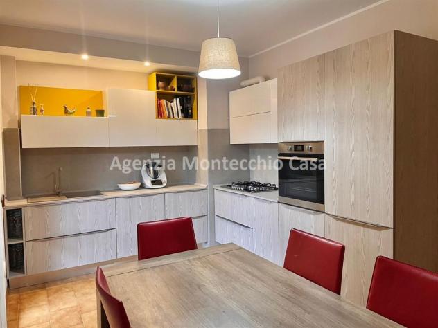 Appartamento con mansarda, garage e giardino esclusivo.