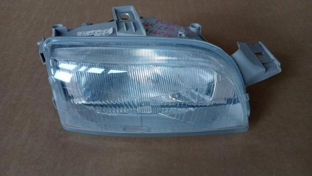 PROIETTORE D/REG.ALT.(07/9504/97)
(MM LPB481) 999-U1294728 Parti elettriche  Fanaleria  Proiettori  Proiettore ant. FIAT - PUNTO I 55 / 60 / 85 / GT -
